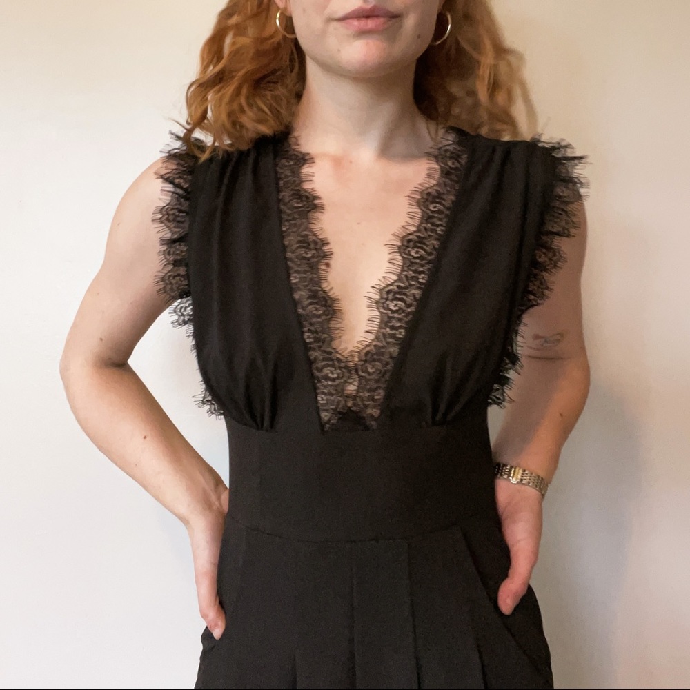 BNWT XXS - XS Francesca's Black Jumpsuit with lace trimming